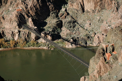 The Black Bridge over a green Colorado