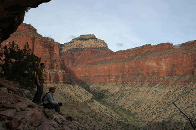 Bill & Dennis below Butchart's cave with North Rim in background