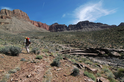 Approaching a pouroff in a drainage below Evans Butte