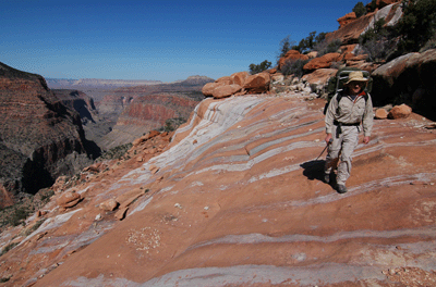 John hiking along the Esplanade in Crazy Jug Canyon