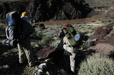 Pausing to observe a river party above Shinumo Rapids