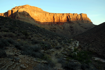 The first light of day kisses Lyell Butte