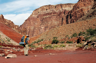 Bill hiking through Red Canyon creek