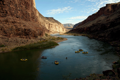 A river party approaches the riffles at Papago Creek