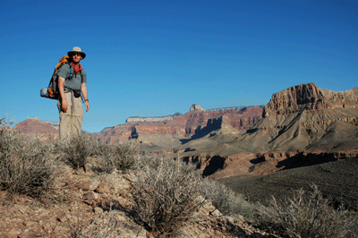 Bill along the Tonto with Sumner Butte and Budha Temple in the background