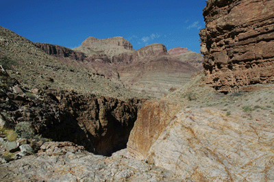 The downpour where the Escalante route leaves Seventyfive Mile Canyon. The tail skirts the canyon ledge to the right