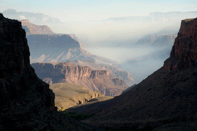 Smoke from a north rim fire fills Bright Angel Canyon