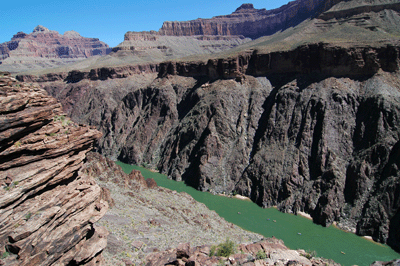 A river party floats below Boucher Rapids with Tower of Ra (top right of center) and Mencius Temple (top far left) visible across the river