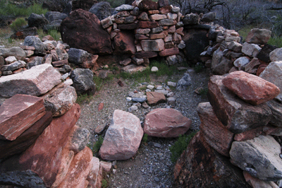 Standing at the entrance of the remains of Louis Boucher's cabin