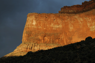 The Battleship bathed in evening light