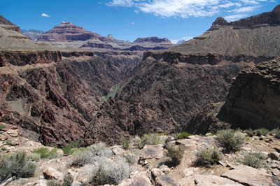 Looking upstream with a view of Isis Temple (left), Cheops Pyramid (right) and the spire of Buddha Temple (middle)