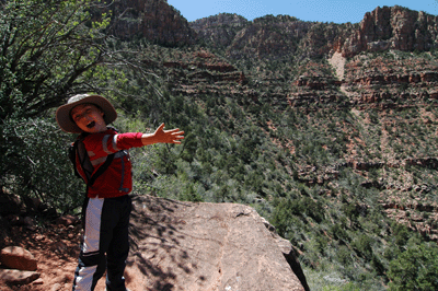 Pointing out the rock layers in Cottonwood Canyon