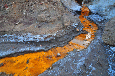 Minerals tarnish the flow of water into Kwagunt Creek