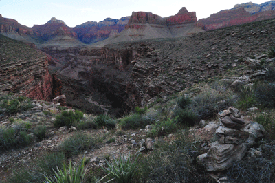 Cairns mark the beginning of the descent route into the east arm of Clear Creek