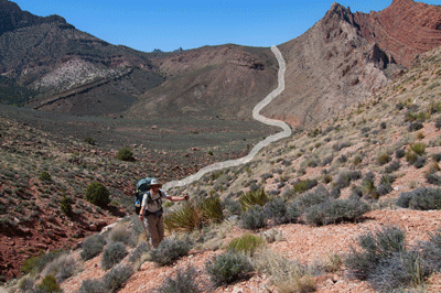 Hiking up the southern slopes of Awatubi with Kwagunt Butte visible in the distance