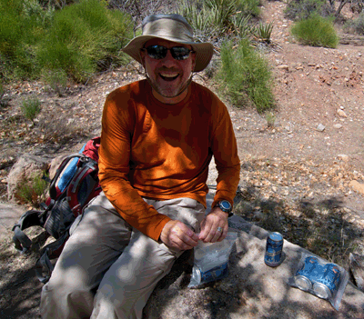 Chris delivers the goods -ice cold beer at the Still Spring in Lava