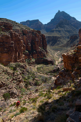 Hiking down north Unkar with Vishnu Temple visible in the distance