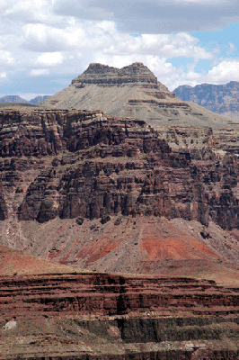 Looking northeast toward Solomon Temple. John Hance's asbestos mines are visible as excavations in the Tapeats in the foreground