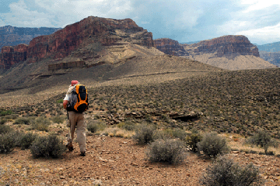 Dennis hiking below Horseshoe Mesa