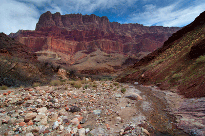 Palisades of the Desert looms over the Colorado River at the mouth of Lava Creek