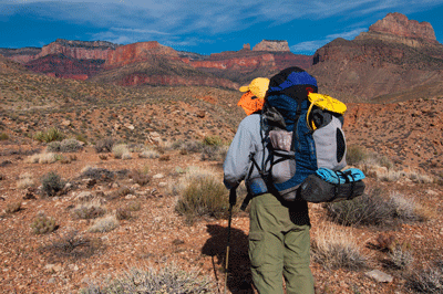 Dennis surveys Chuar Valley to the northwest, including Chiavria Point and Hubbell Butte