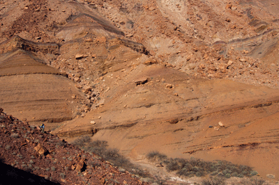 Dennis descends a hill into the bed of Basalt Creek