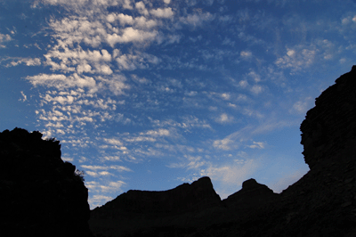 Early morning light paints the clouds above Trinity