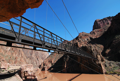 The Black Bridge spans the muddy Colorado River